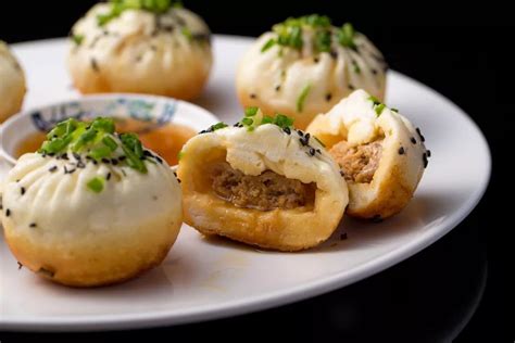  Aromático e Reconfortante: Uma Jornada Gastronômica Através do Shengjian Bao de Jining!