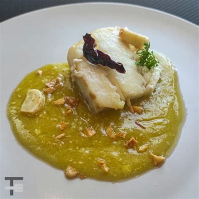  Bacalao al Pil-Pil: Uma explosão de sabor salgado e uma textura surpreendentemente suave!