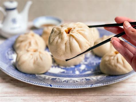  Lianhua Baozi: Uma Sinfonia de Sabores Delicados Embrulhados em umEnvelope de Vapor!